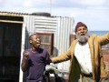 40-Leon Schuster as Homeless man-squatter camp scene